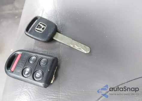 2010 Honda Odyssey Ex-L z USA, uszkodzony, nr VIN 5FNRL3H73AB091558